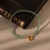 Pearl and Jade-Tone Charm Bracelet - Gradwandrung